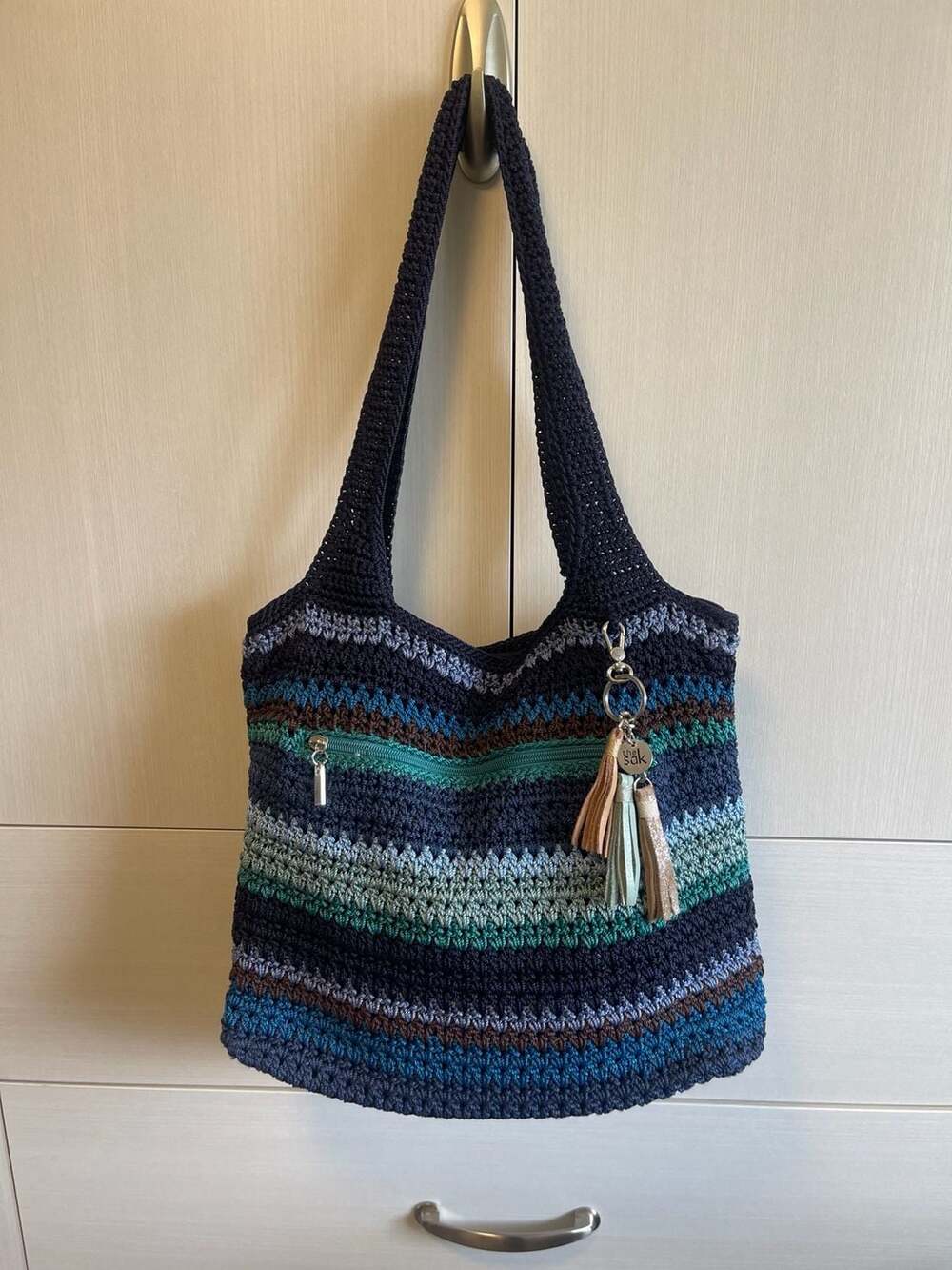 The Sak Crochet Stripe Shoulder Bag with Tassel Charm